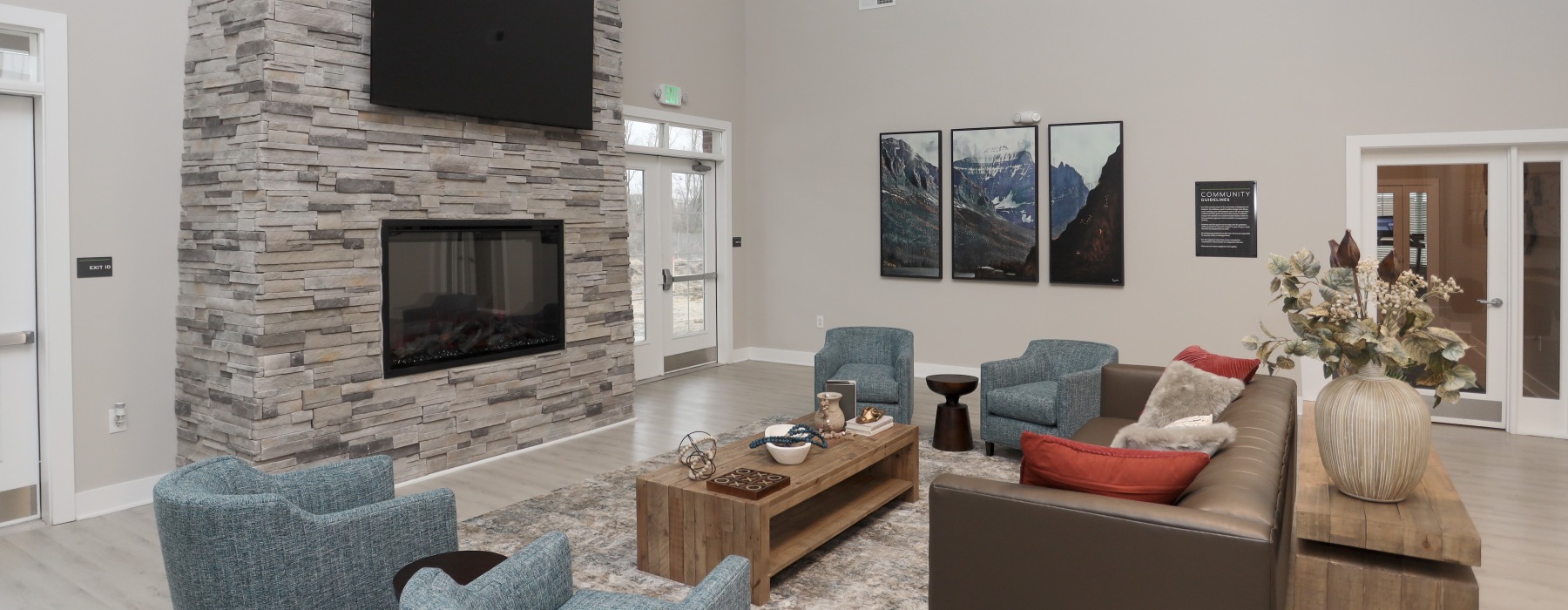 seating area with fireplace and TV